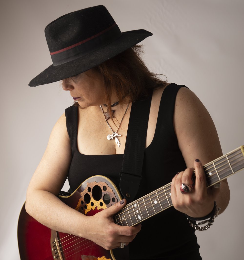Mavic Bush, lead guitarrist player for the Blues Rock band